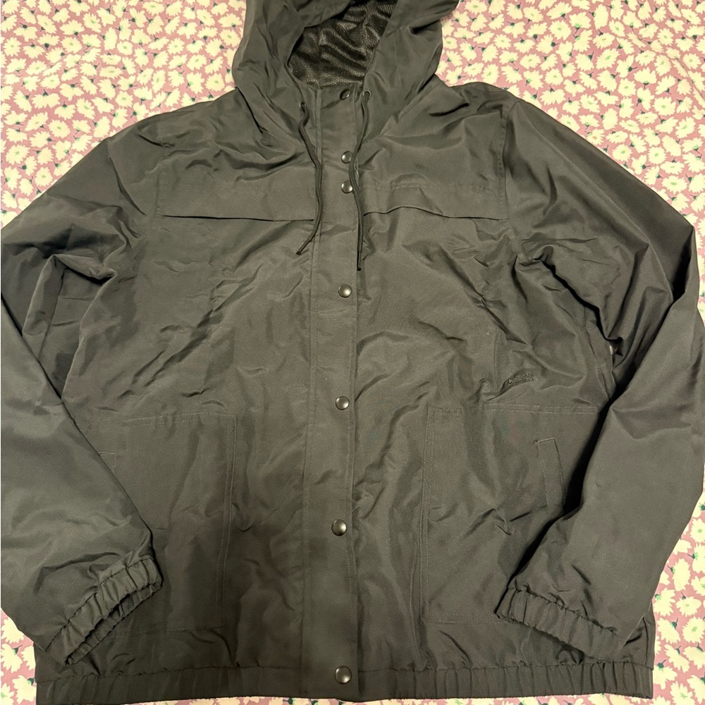 Like new! Volcom women’s black rain coat with hood